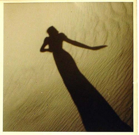 Olive Cotton-[Model's Shadow on Sand], c1937